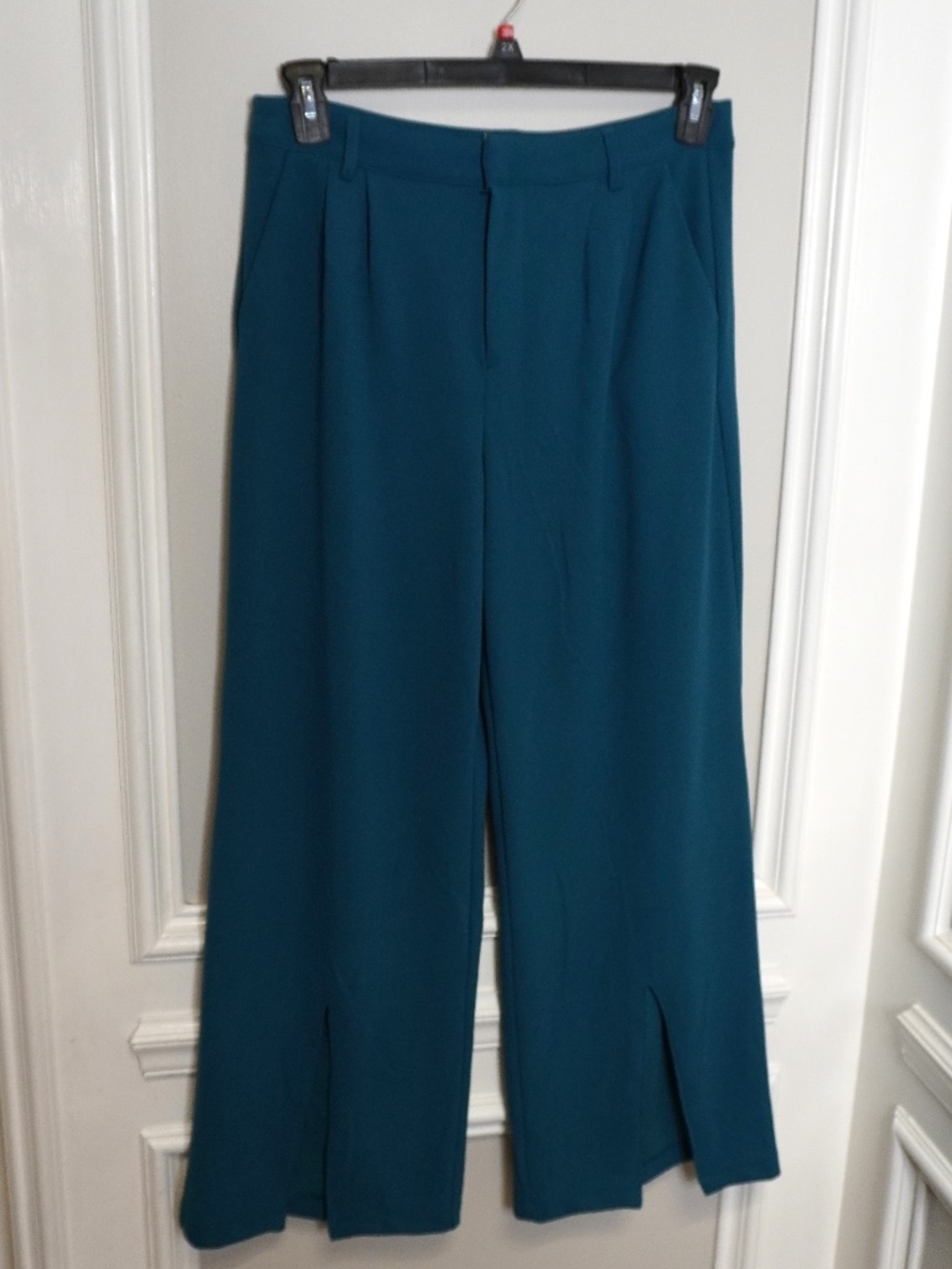 Happily Grey High-waisted wide-leg trousers with front slits at the bottom.